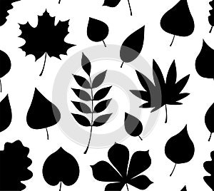 Seamless pattern with black autumn leaves