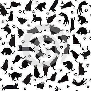 Seamless pattern with black cats silhouettes