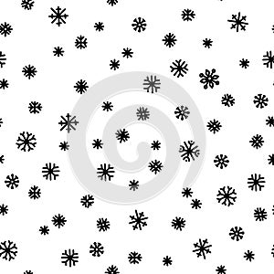 Seamless pattern of black snowflakes on a white background. Simple pattern for backdrops, wrapping paper and seasonal