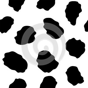 Seamless pattern with black stains on a white background. Cartoon texture of cow color. Vector illustration.