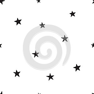 Seamless pattern with black stars on a white background. Vector illustration.