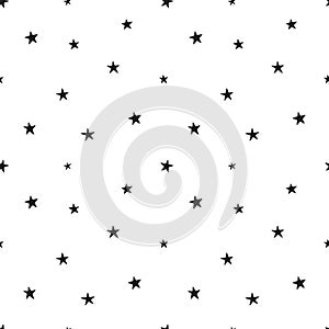 Seamless pattern with black stars on a white background. Vector illustration.