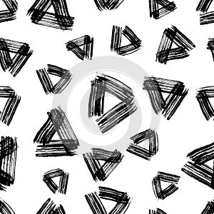 Seamless pattern with black triangle grunge brush strokes