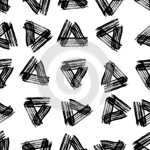 Seamless pattern with black triangle grunge brush strokes