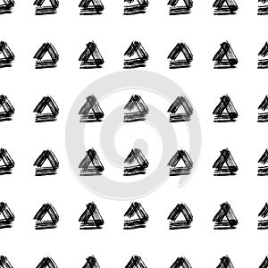 Seamless pattern with black triangle grunge brush strokes