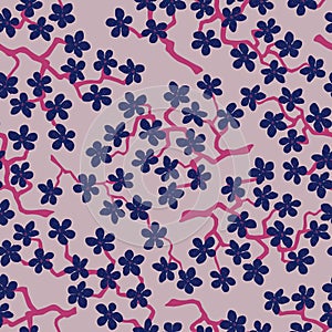 Seamless pattern with blossoming Japanese cherry sakura branches.Blue flowers on pink background
