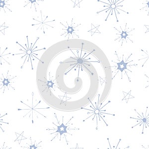 Seamless pattern with blue snowflakes on white