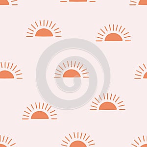 Seamless pattern with bright suns on a light background