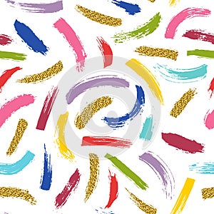 Seamless pattern. Brush strokes in different colors and golden glitter paintisolated on white background