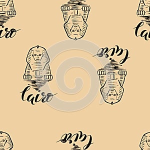 Seamless pattern with Cairo label with hand drawn Sphinx, lettering Cairo on beige background