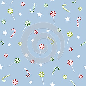 Seamless pattern with candy cane and lollipop. Vector illustration.