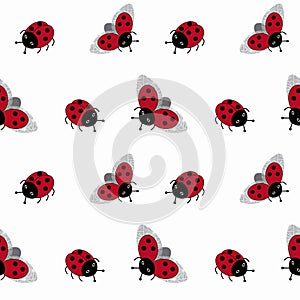 Seamless pattern with cartoon ladybugs on a white background