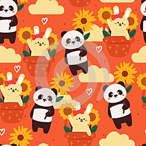 Seamless pattern cartoon panda and rabbit in orange background. cute animal wallpaper for textile, gift wrap paper