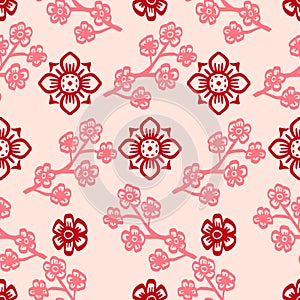 Seamless pattern with cherry blossoms on a beige background.