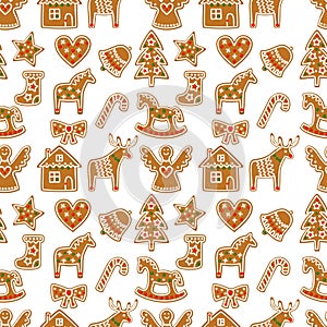 Seamless pattern with Christmas gingerbread cookies - Xmas tree, candy cane, angel, bell, sock, gingerbread men, star, heart, deer photo