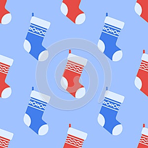 Seamless pattern with Christmas socks on blue background