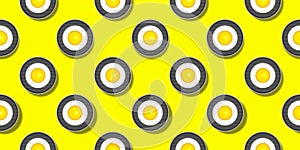 Seamless pattern with circles on yellow background