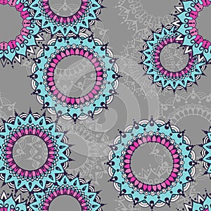 Seamless pattern with circular floral ornaments