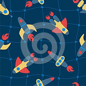 Seamless pattern of colorful rockets on blue background. Cosmic grid of stars. Ideal for kids design, fabric, wrapping, wallpaper