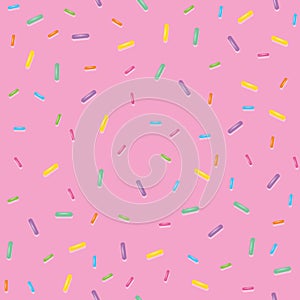 Seamless pattern colorful sweet sprinkles on pink background