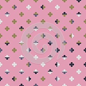 Seamless pattern of colourful four leaf clover symbols. The elements create chequered texture on happy pink background.