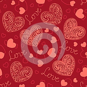 Seamless pattern with coral lacy hearts and silhouettes of small hearts.