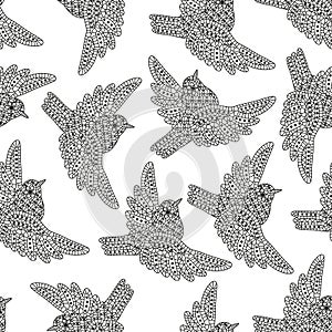 Seamless pattern with creative birds. Decorative sparrows. Good for wrapping, coloring books, cards, etc. Black and white colors.