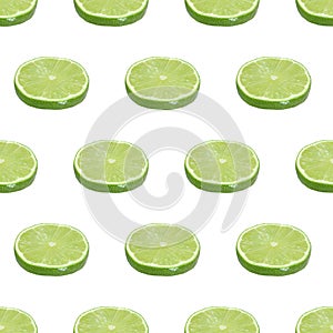 Seamless pattern from cut limes fruits isolated on white background