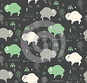 Seamless pattern with cute baby buffaloes and native American sy photo