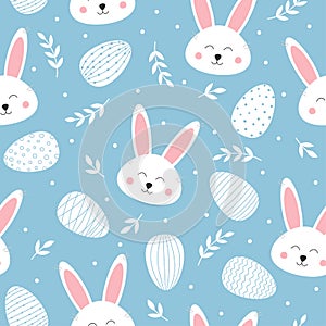 Seamless pattern with cute bunny and easter eggs. Lovely rabbit on blue background. Background for easter design