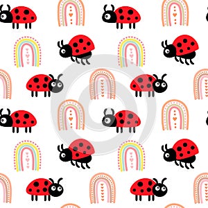 Seamless pattern, cute colorful ladybugs and rainbows on a white background. Textile for kids, decor for kids bedroom