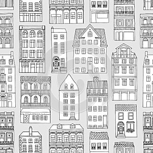 Seamless pattern with cute hand drawn houses