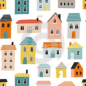 Seamless pattern with cute houses. Hand drawn vector illustration for nursery textile