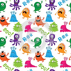 Seamless pattern with cute monsters and inscriptions