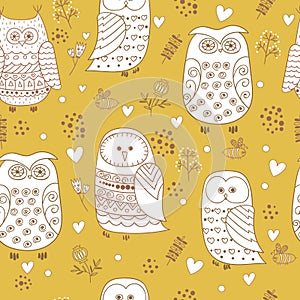 Seamless pattern with cute owls, flowers and hearts.