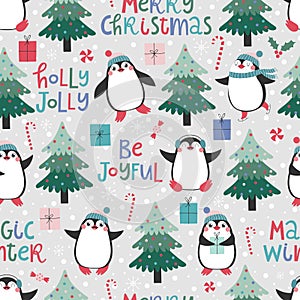 Seamless pattern with cute pinguins, christmas elements and text Merry Christmas photo