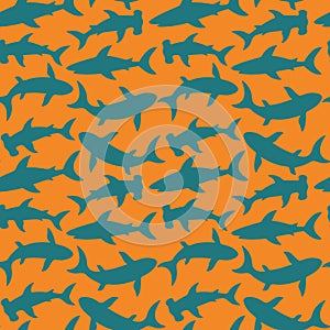 Seamless pattern with cute sharks silhouette. Vector illustration.