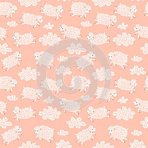 Seamless pattern with cute sheep and clouds.