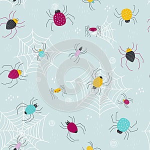 Seamless pattern with cute spiders. Vector illustrations