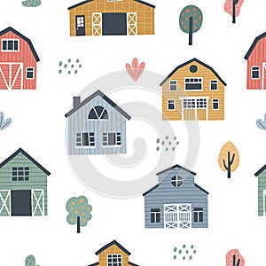 Seamless pattern with cute village houses. HAnd drawn vector illustration for kids design