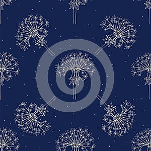 Seamless pattern of dandelions on a navy background.