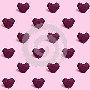 Seamless pattern with dark red or purple polygonal paper heart on pink background. Wallpaper for Valentines Day. Love