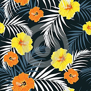 Seamless pattern, dark vintage colors, palm leaves and yellow, orange hibiscus flowers on dark blue background