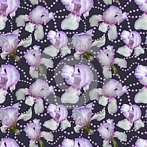 Seamless pattern. Delicate flowers of irises on a purple underlay with pearl beads