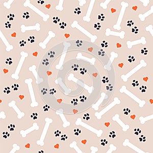 Seamless pattern design with  dog paw traces, bone silhouettes and heart shapes isolated on white background.