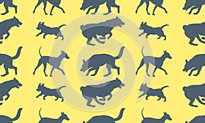 Seamless pattern. Different dogs in various poses. Isolated on a yellow background. Endless texture. Design for fabric