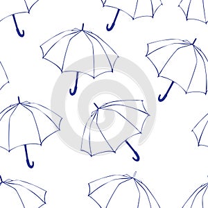 Seamless pattern with doodle umbrellas. For fabric, textile