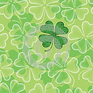 Seamless pattern with dotted four leaf clover in white on the green background. Traditional symbol of St. Patrick Day.