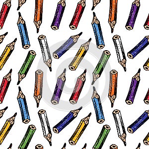 Seamless pattern of drawn colorful wooden pencils