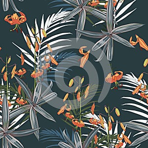 Seamless pattern with exotic tropical palms and lilies flowers on the dark background. photo